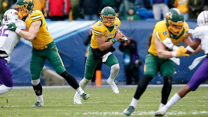 In the FCS title game, Lance threw just 10 passes but ran for 166 yards as the Bison beat James Madison.